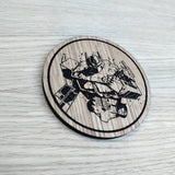 Laser cut wooden coaster personalised. Optimus Prime torso. Fist clenched