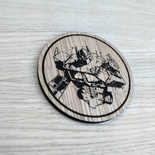 Laser cut wooden coaster personalised. Optimus Prime torso. Fist clenched