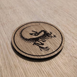 Laser cut wooden coaster personalised. Raptor Dinosaur Skeleton Fossil