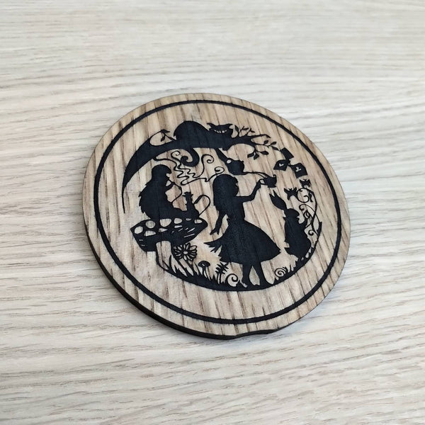 Laser cut wooden coaster personalised. Alice Madness Tea Party