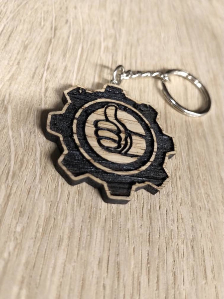 Lasercut wooden keyring keychain. vault thumbs up