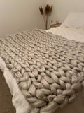 Chunky wool arm knitted blanket throw. Handmade