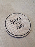 Laser cut wooden coaster personalised. King of Avalon siege the day