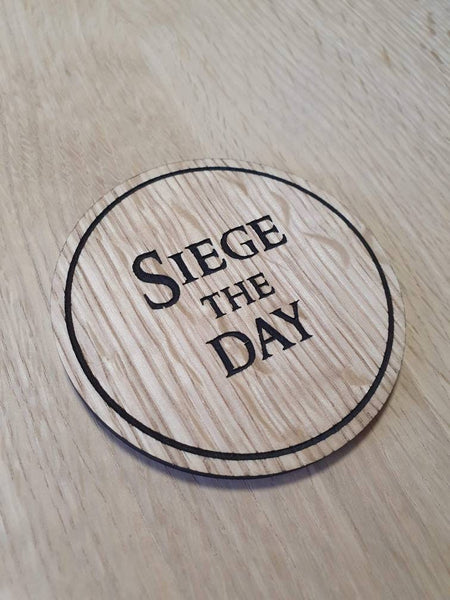 Laser cut wooden coaster personalised. King of Avalon siege the day