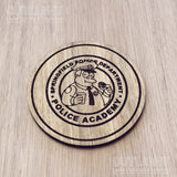 Laser cut wooden coaster personalised. Police Academy pun cartoon