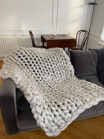 Chunky arm knitted wool blanket